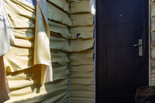 Melted Siding Replacement in Garland