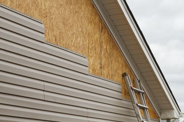 Loose Siding Replacement in Garland
