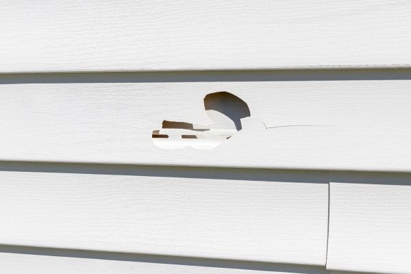 White Vinyl Siding Repair in Garland